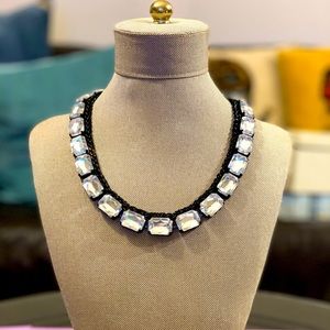 Clear stone and black metal link necklace